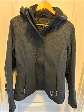 Spyder Women's Hooded Ski Jacket in Charcoal Gray with Subtle Shimmer